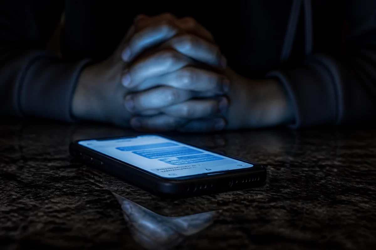 Smartphone on a table illustrating digital evidence risks in a Stafford VA divorce case.